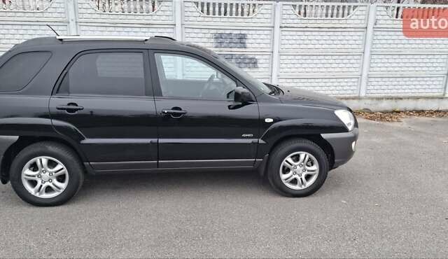 Черный Киа Sportage, объемом двигателя 2 л и пробегом 170 тыс. км за 8700 $, фото 1 на Automoto.ua