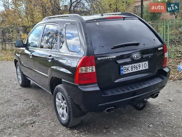 Черный Киа Sportage, объемом двигателя 1.99 л и пробегом 283 тыс. км за 6850 $, фото 5 на Automoto.ua