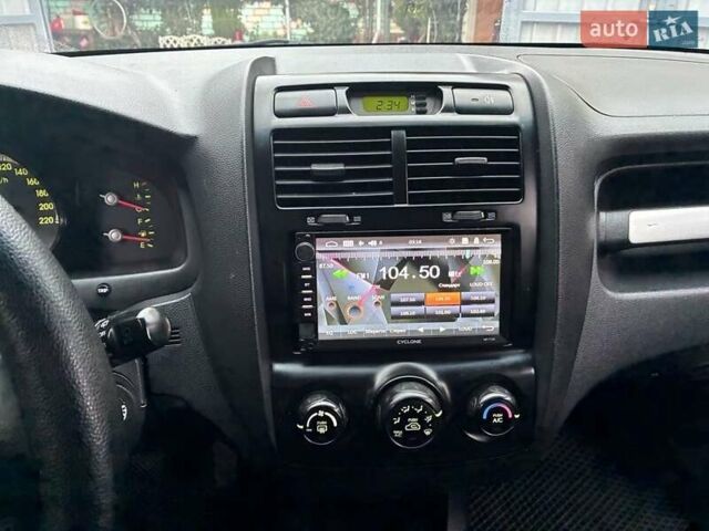 Черный Киа Sportage, объемом двигателя 2 л и пробегом 322 тыс. км за 7000 $, фото 5 на Automoto.ua