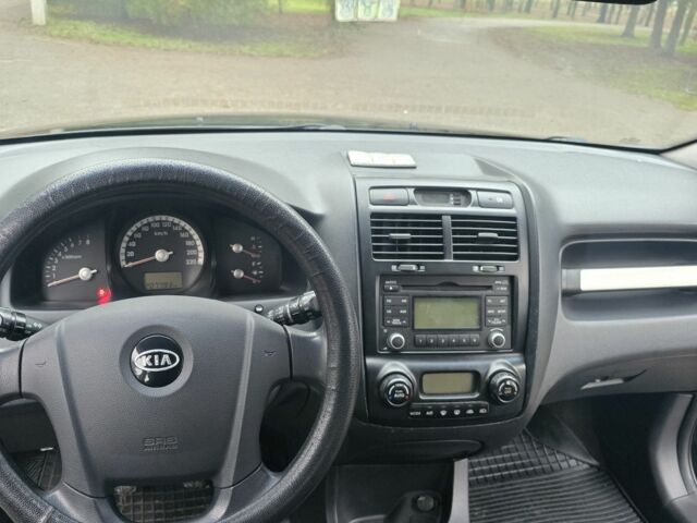 Чорний Кіа Sportage, об'ємом двигуна 2 л та пробігом 207 тис. км за 7000 $, фото 1 на Automoto.ua