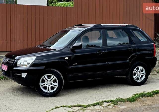 Чорний Кіа Sportage, об'ємом двигуна 2 л та пробігом 172 тис. км за 7999 $, фото 32 на Automoto.ua