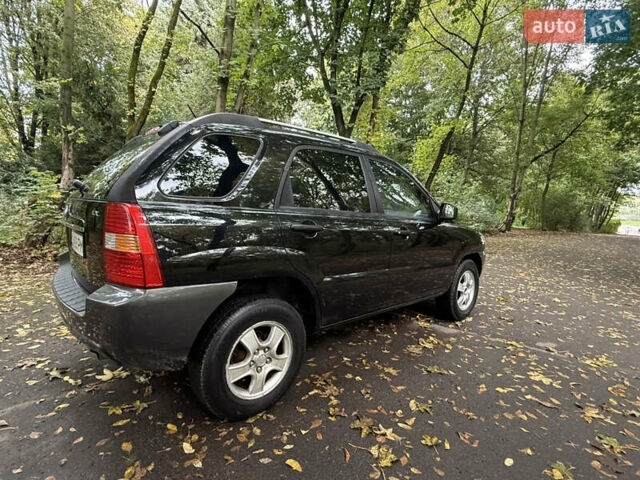 Киа Sportage 2006 в Львове на Automoto.ua Черный Киа Sportage, объемом двигателя 2 л и пробегом 182 тыс. км за 6250 $, фото 11 на Automoto.ua