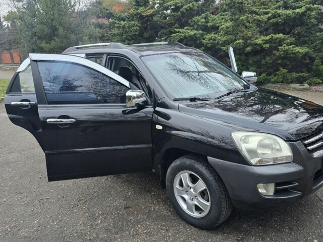 Чорний Кіа Sportage, об'ємом двигуна 2 л та пробігом 207 тис. км за 7000 $, фото 7 на Automoto.ua