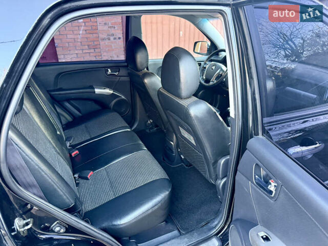 Черный Киа Sportage, объемом двигателя 2 л и пробегом 159 тыс. км за 7650 $, фото 14 на Automoto.ua