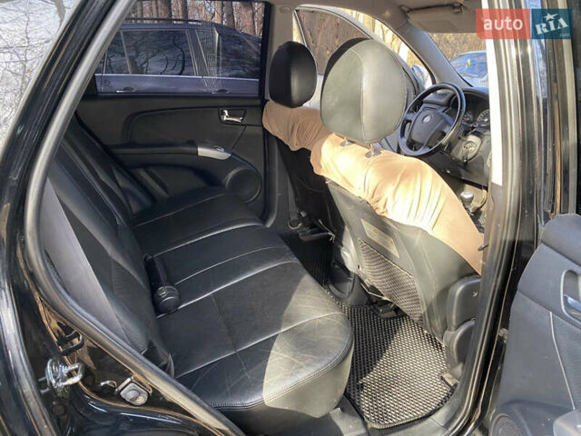 Черный Киа Sportage, объемом двигателя 1.99 л и пробегом 350 тыс. км за 8400 $, фото 12 на Automoto.ua