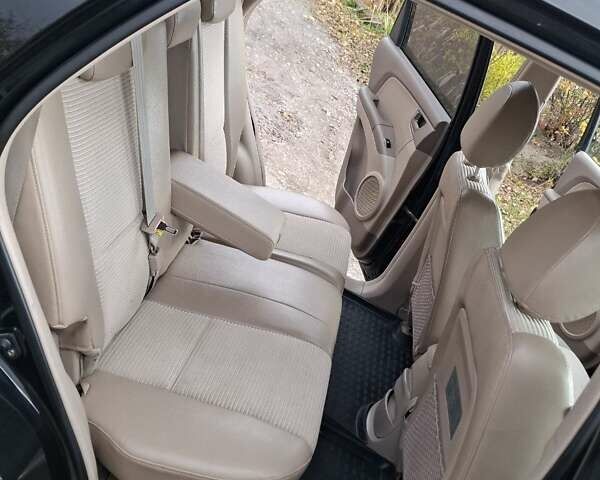 Черный Киа Sportage, объемом двигателя 1.99 л и пробегом 283 тыс. км за 6850 $, фото 41 на Automoto.ua