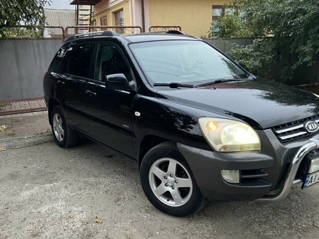 Чорний Кіа Sportage, об'ємом двигуна 2 л та пробігом 227 тис. км за 6900 $, фото 8 на Automoto.ua
