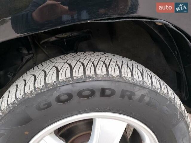 Чорний Кіа Sportage, об'ємом двигуна 2 л та пробігом 150 тис. км за 7000 $, фото 18 на Automoto.ua