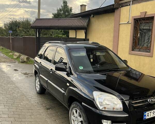 Черный Киа Sportage, объемом двигателя 1.99 л и пробегом 257 тыс. км за 8200 $, фото 2 на Automoto.ua