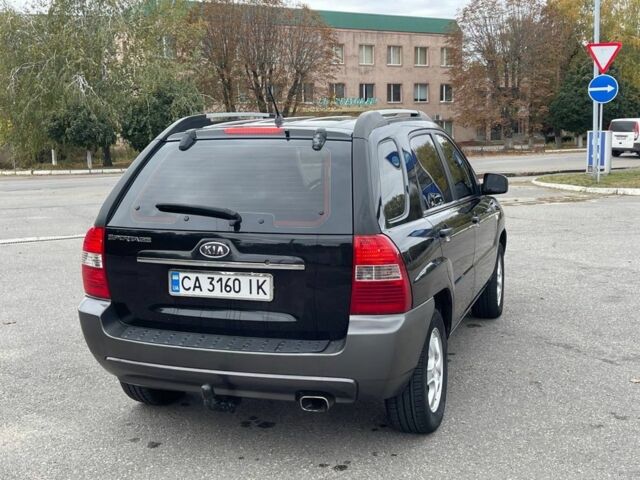 Черный Киа Sportage, объемом двигателя 2 л и пробегом 202 тыс. км за 6500 $, фото 4 на Automoto.ua