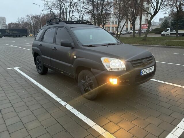 Черный Киа Sportage, объемом двигателя 2 л и пробегом 322 тыс. км за 7000 $, фото 2 на Automoto.ua