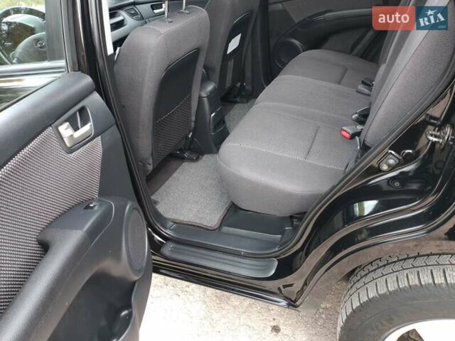 Чорний Кіа Sportage, об'ємом двигуна 2 л та пробігом 150 тис. км за 7000 $, фото 33 на Automoto.ua