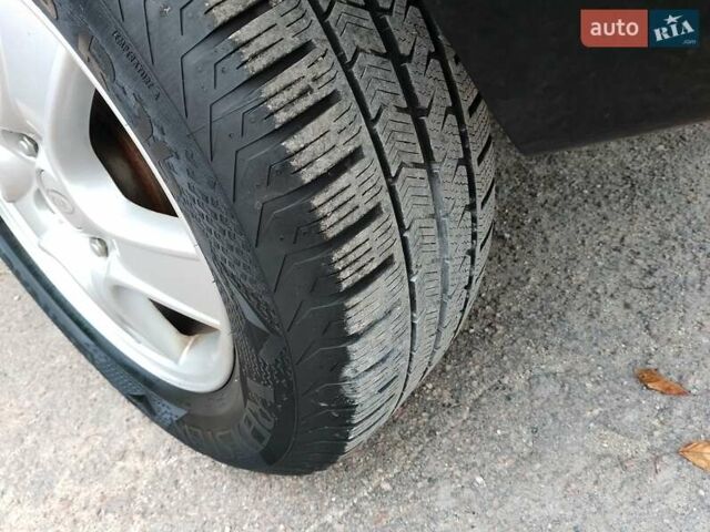 Чорний Кіа Sportage, об'ємом двигуна 2 л та пробігом 150 тис. км за 7000 $, фото 19 на Automoto.ua