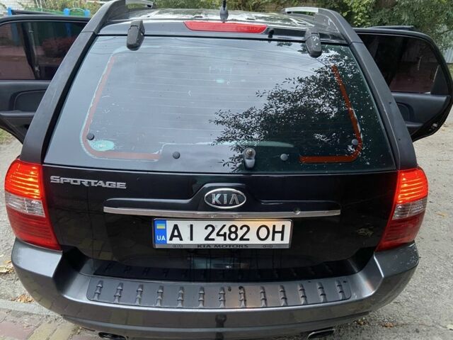Чорний Кіа Sportage, об'ємом двигуна 2 л та пробігом 227 тис. км за 6900 $, фото 4 на Automoto.ua