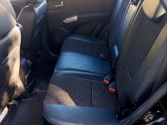 Чорний Кіа Sportage, об'ємом двигуна 2 л та пробігом 197 тис. км за 6900 $, фото 2 на Automoto.ua