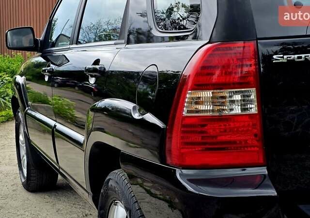 Чорний Кіа Sportage, об'ємом двигуна 2 л та пробігом 172 тис. км за 7999 $, фото 22 на Automoto.ua