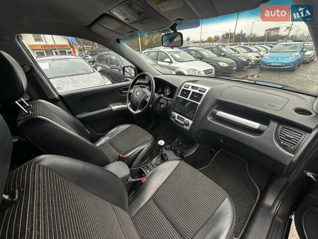 Чорний Кіа Sportage, об'ємом двигуна 2 л та пробігом 250 тис. км за 8300 $, фото 22 на Automoto.ua