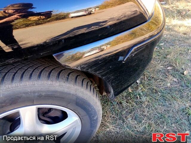 Чорний Кіа Sportage, об'ємом двигуна 2 л та пробігом 197 тис. км за 6900 $, фото 1 на Automoto.ua