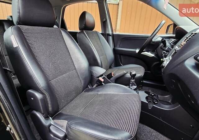 Чорний Кіа Sportage, об'ємом двигуна 2 л та пробігом 172 тис. км за 7999 $, фото 49 на Automoto.ua