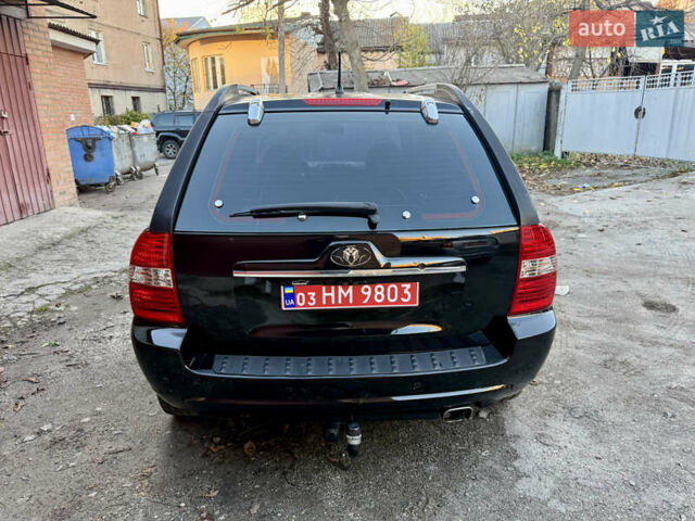 Черный Киа Sportage, объемом двигателя 2 л и пробегом 159 тыс. км за 7650 $, фото 7 на Automoto.ua