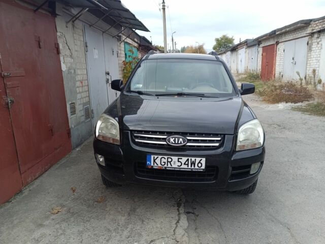 Черный Киа Sportage, объемом двигателя 2 л и пробегом 307 тыс. км за 4800 $, фото 1 на Automoto.ua