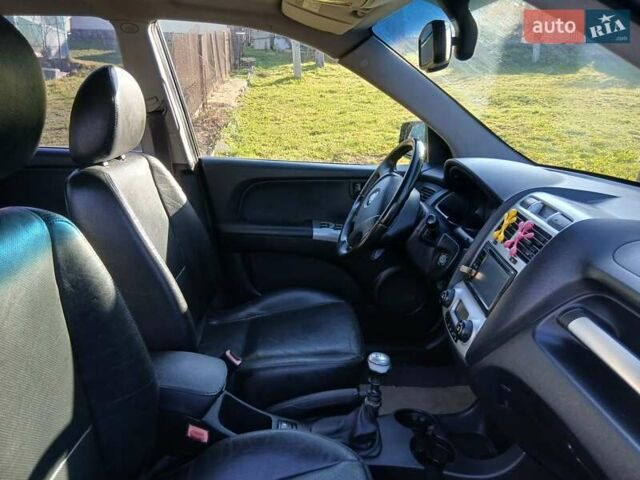 Черный Киа Sportage, объемом двигателя 1.99 л и пробегом 281 тыс. км за 6800 $, фото 7 на Automoto.ua