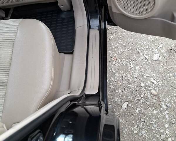 Черный Киа Sportage, объемом двигателя 1.99 л и пробегом 283 тыс. км за 6850 $, фото 48 на Automoto.ua