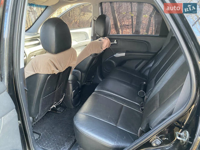 Черный Киа Sportage, объемом двигателя 1.99 л и пробегом 350 тыс. км за 8400 $, фото 13 на Automoto.ua