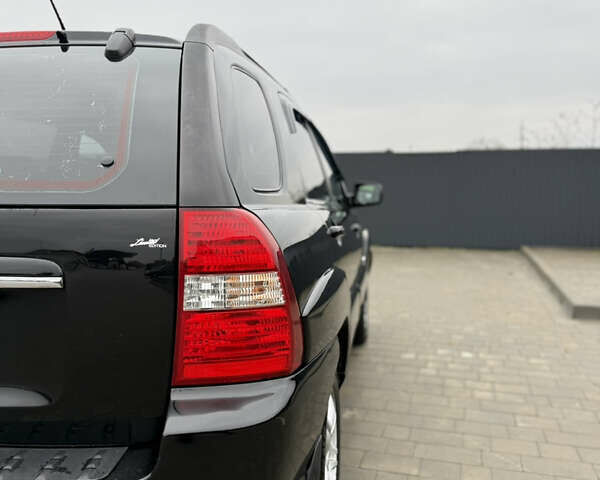 Чорний Кіа Sportage, об'ємом двигуна 1.98 л та пробігом 248 тис. км за 6999 $, фото 7 на Automoto.ua