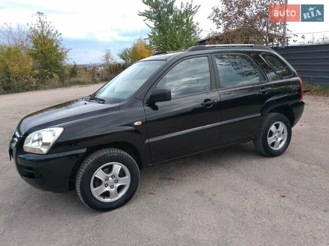 Чорний Кіа Sportage, об'ємом двигуна 2 л та пробігом 150 тис. км за 7000 $, фото 15 на Automoto.ua
