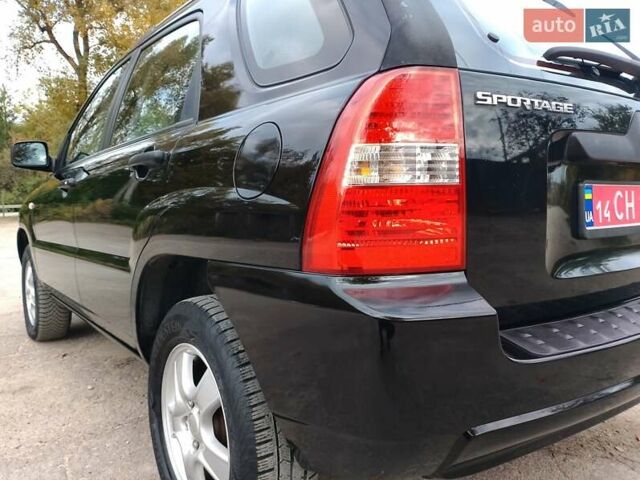 Чорний Кіа Sportage, об'ємом двигуна 2 л та пробігом 150 тис. км за 7000 $, фото 22 на Automoto.ua