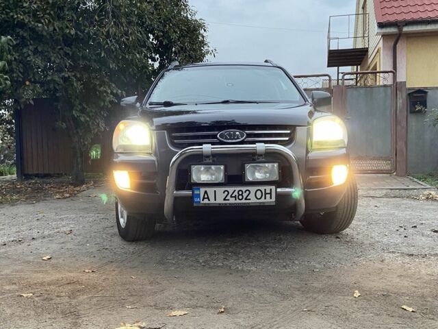 Чорний Кіа Sportage, об'ємом двигуна 2 л та пробігом 227 тис. км за 6900 $, фото 3 на Automoto.ua