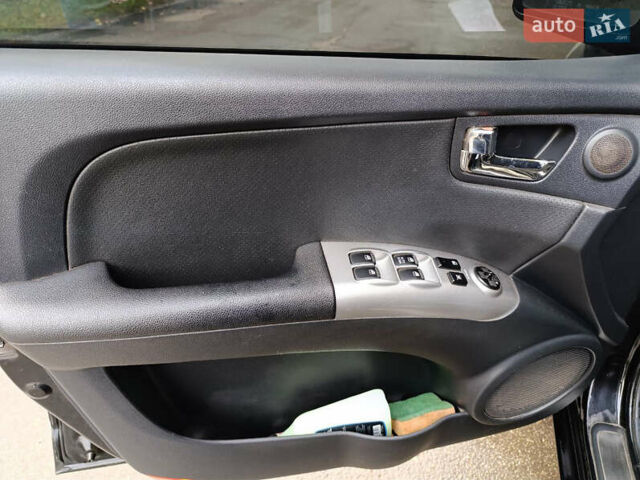 Чорний Кіа Sportage, об'ємом двигуна 1.98 л та пробігом 232 тис. км за 7900 $, фото 15 на Automoto.ua