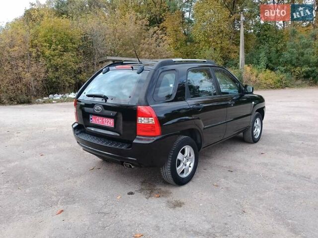 Чорний Кіа Sportage, об'ємом двигуна 2 л та пробігом 150 тис. км за 7000 $, фото 29 на Automoto.ua
