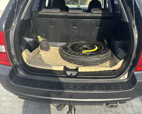 Черный Киа Sportage, объемом двигателя 2 л и пробегом 300 тыс. км за 6800 $, фото 10 на Automoto.ua
