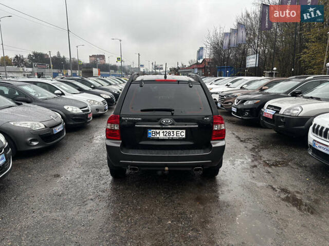 Чорний Кіа Sportage, об'ємом двигуна 2 л та пробігом 250 тис. км за 8300 $, фото 5 на Automoto.ua