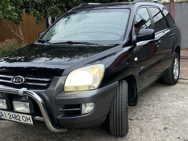 Чорний Кіа Sportage, об'ємом двигуна 2 л та пробігом 227 тис. км за 6900 $, фото 7 на Automoto.ua