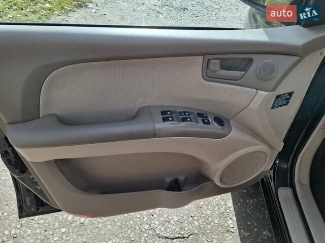 Черный Киа Sportage, объемом двигателя 1.99 л и пробегом 283 тыс. км за 6850 $, фото 21 на Automoto.ua