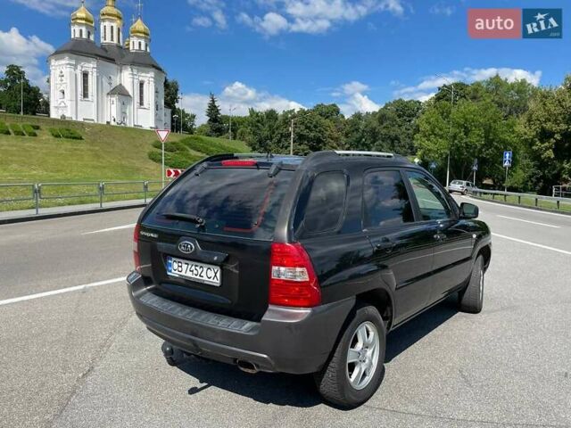 Чорний Кіа Sportage, об'ємом двигуна 1.98 л та пробігом 200 тис. км за 7900 $, фото 6 на Automoto.ua