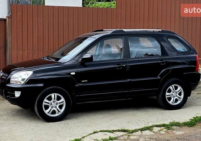 Чорний Кіа Sportage, об'ємом двигуна 2 л та пробігом 172 тис. км за 7999 $, фото 30 на Automoto.ua