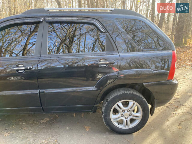 Черный Киа Sportage, объемом двигателя 1.99 л и пробегом 350 тыс. км за 8400 $, фото 3 на Automoto.ua