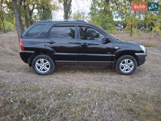 Черный Киа Sportage, объемом двигателя 2.7 л и пробегом 261 тыс. км за 8500 $, фото 6 на Automoto.ua