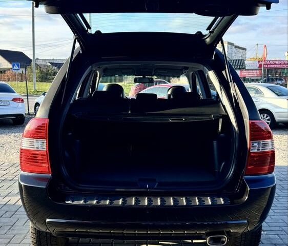 Чорний Кіа Sportage, об'ємом двигуна 2 л та пробігом 178 тис. км за 8800 $, фото 5 на Automoto.ua