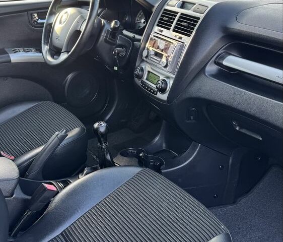 Чорний Кіа Sportage, об'ємом двигуна 2 л та пробігом 178 тис. км за 8800 $, фото 17 на Automoto.ua