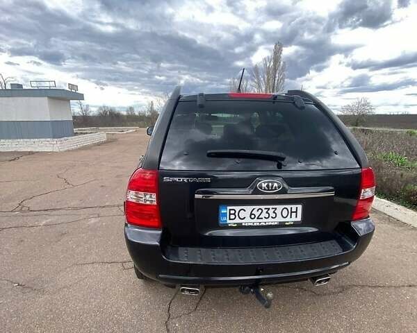 Черный Киа Sportage, объемом двигателя 2 л и пробегом 190 тыс. км за 6600 $, фото 4 на Automoto.ua