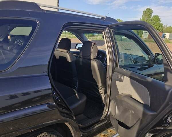 Черный Киа Sportage, объемом двигателя 2 л и пробегом 202 тыс. км за 8300 $, фото 18 на Automoto.ua