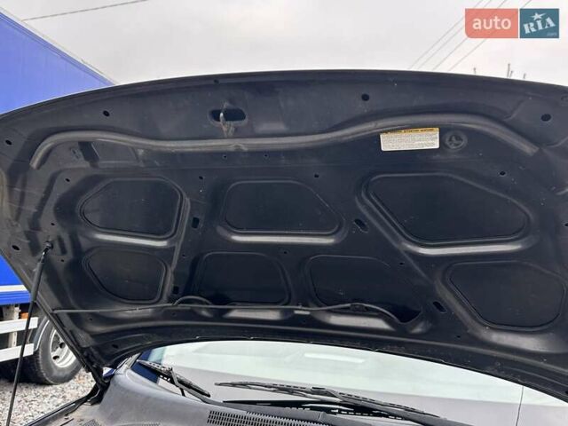 Черный Киа Sportage, объемом двигателя 2 л и пробегом 240 тыс. км за 7650 $, фото 100 на Automoto.ua