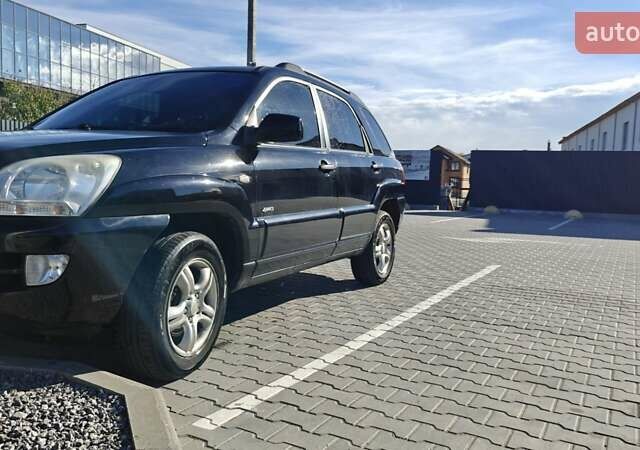 Черный Киа Sportage, объемом двигателя 1.98 л и пробегом 234 тыс. км за 8000 $, фото 5 на Automoto.ua