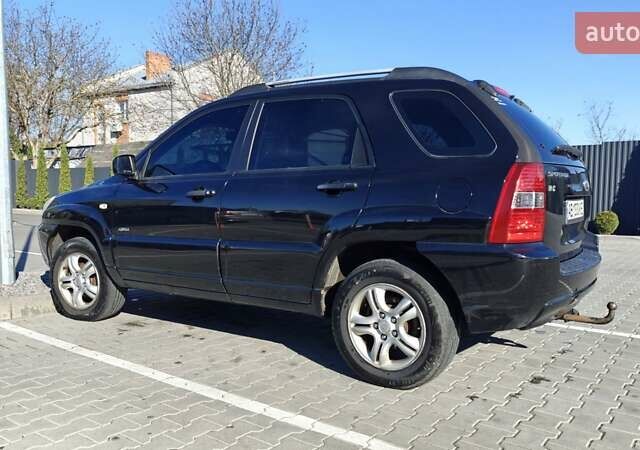 Черный Киа Sportage, объемом двигателя 1.98 л и пробегом 234 тыс. км за 8000 $, фото 7 на Automoto.ua