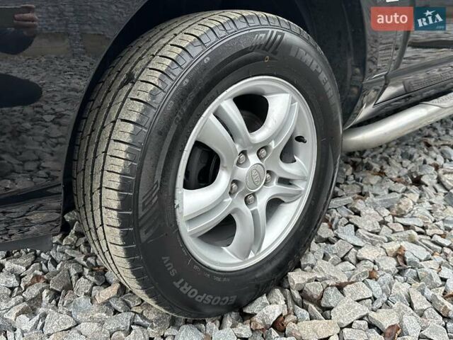 Черный Киа Sportage, объемом двигателя 2 л и пробегом 240 тыс. км за 7650 $, фото 13 на Automoto.ua